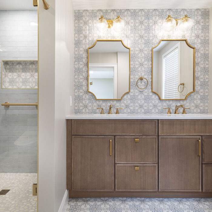Double vanity bathroom with patterned tile