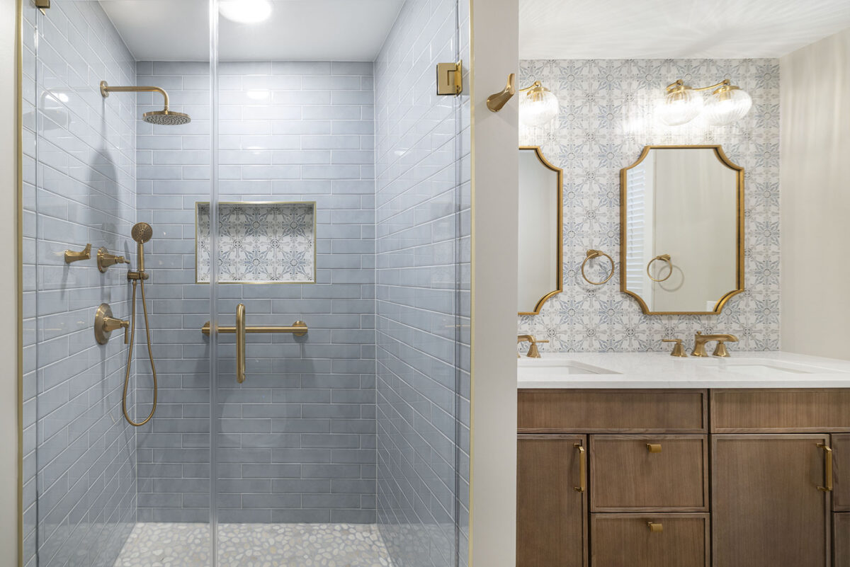 Modern bathroom with glass shower and double vanity