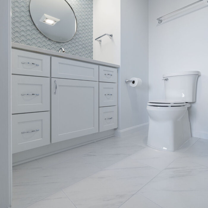 Modern white bathroom with vanity and toilet