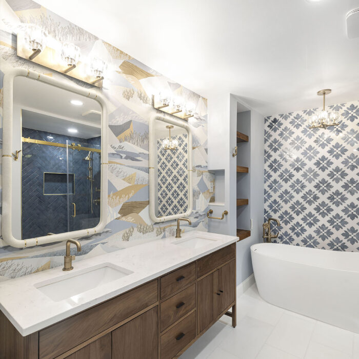 Modern bathroom with double vanity and freestanding tub