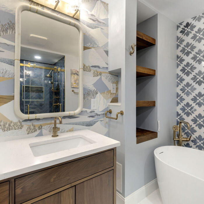 Modern bathroom with vanity, mirror, freestanding tub