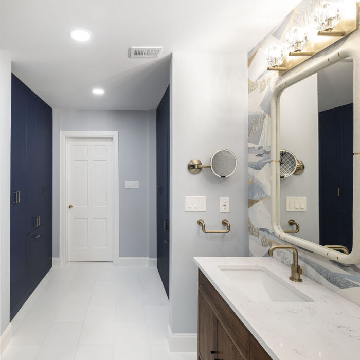 Modern bathroom with vanity and large mirror