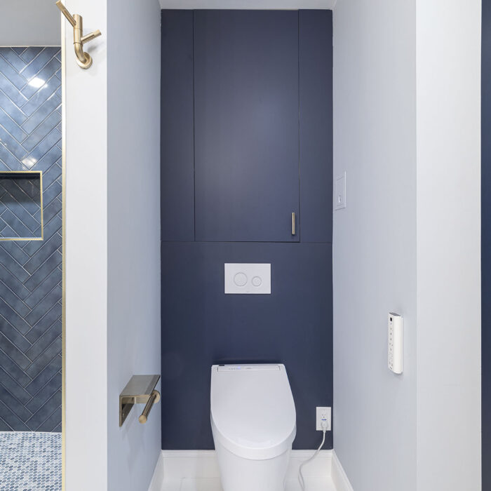Compact modern bathroom with wall-mounted toilet