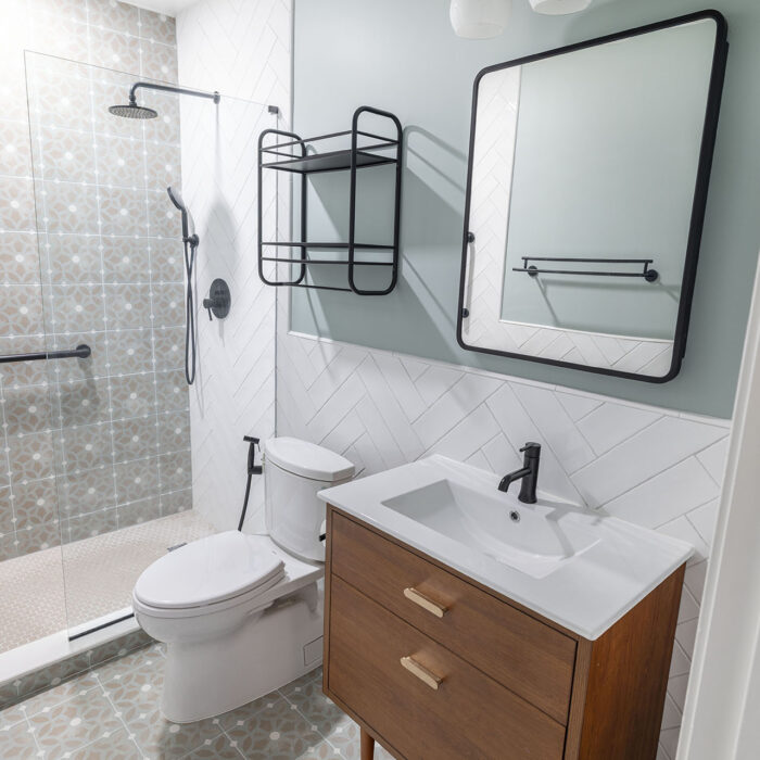 Modern bathroom with wooden vanity and shower