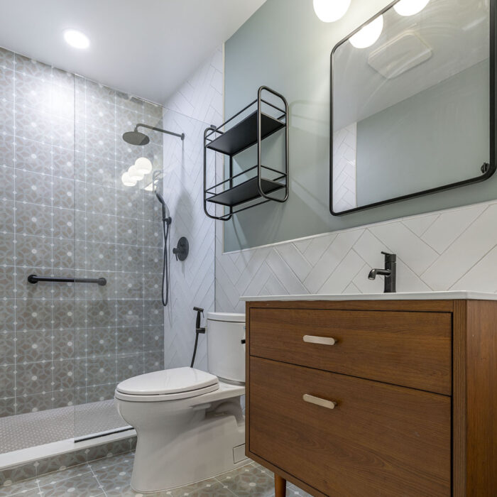 Modern bathroom with wooden vanity and shower