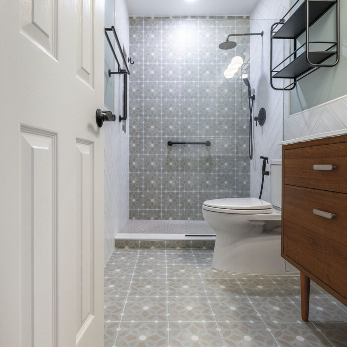 Modern bathroom with patterned tile and shower