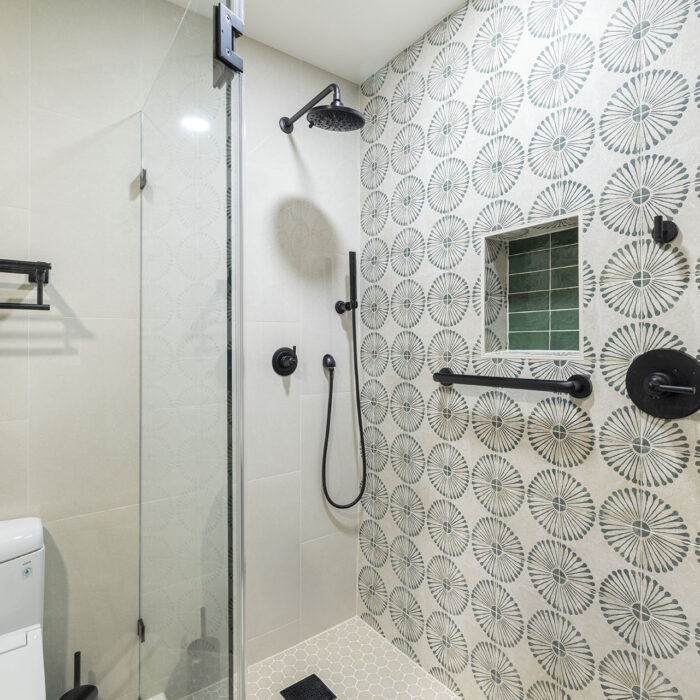 Modern shower with patterned tile wall